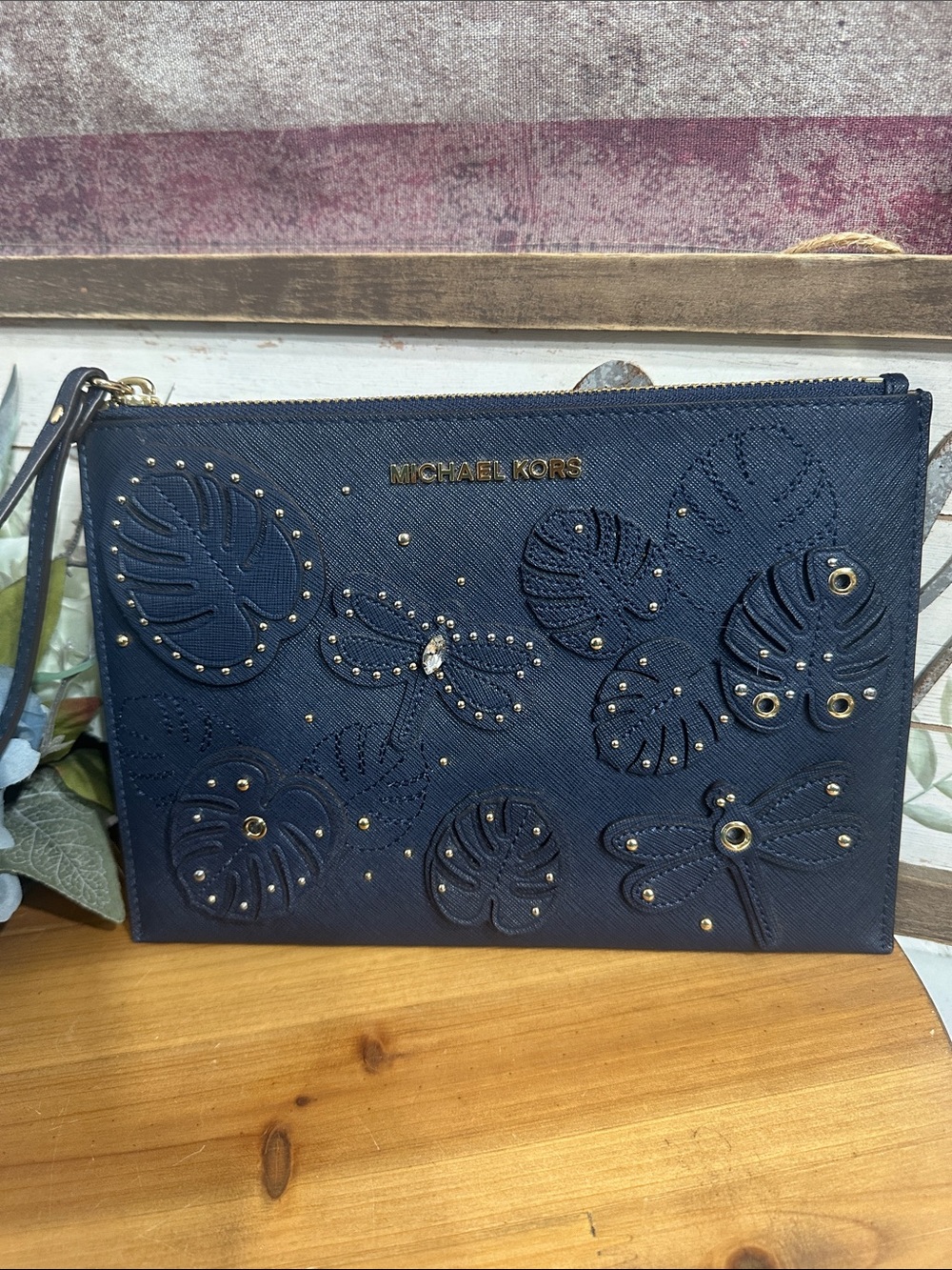NWOT Michael Kors Navy Embossed Leaf & Dragonfly Wristlet with Gold Accents